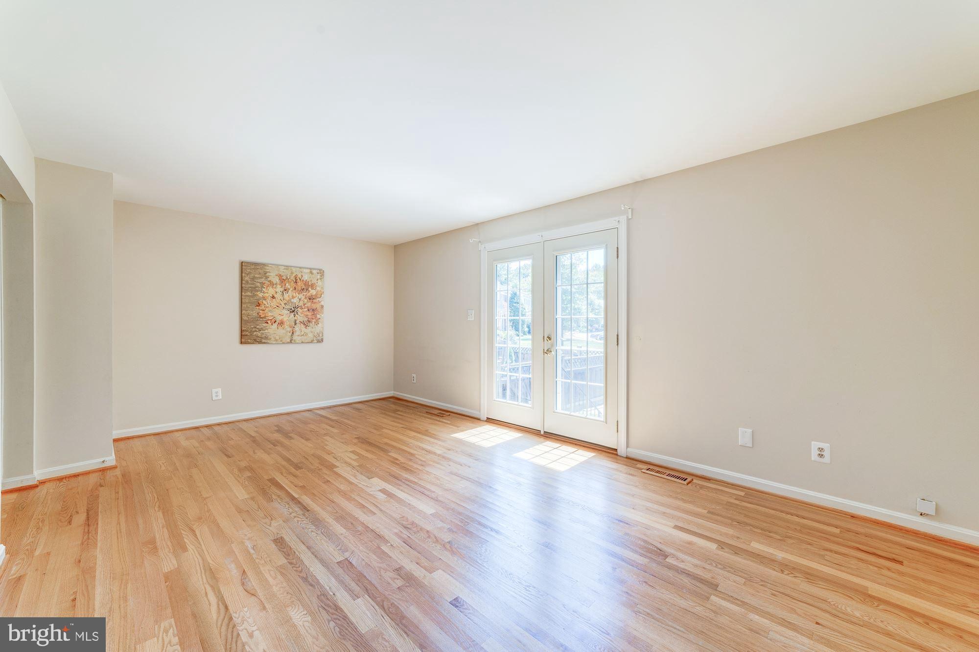 1567 Dunterry Place McLean, VA 22101 - Photo 14 of 35 Living Room with doors leading to back yard