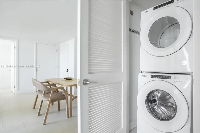 a view of a house with washer and dryer