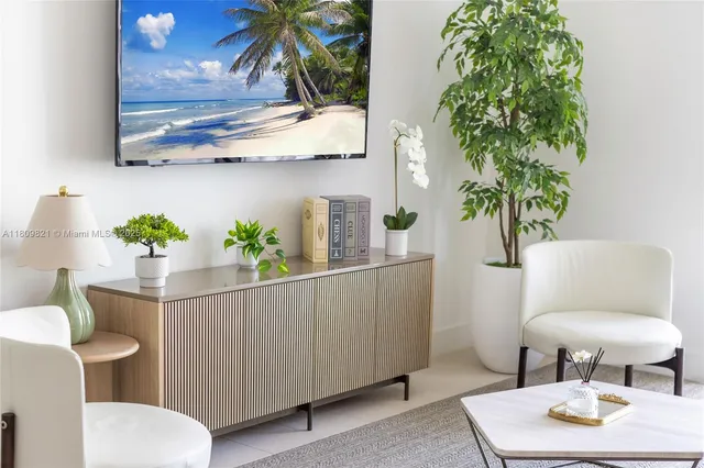 a bathroom with a toilet a sink and a mirror