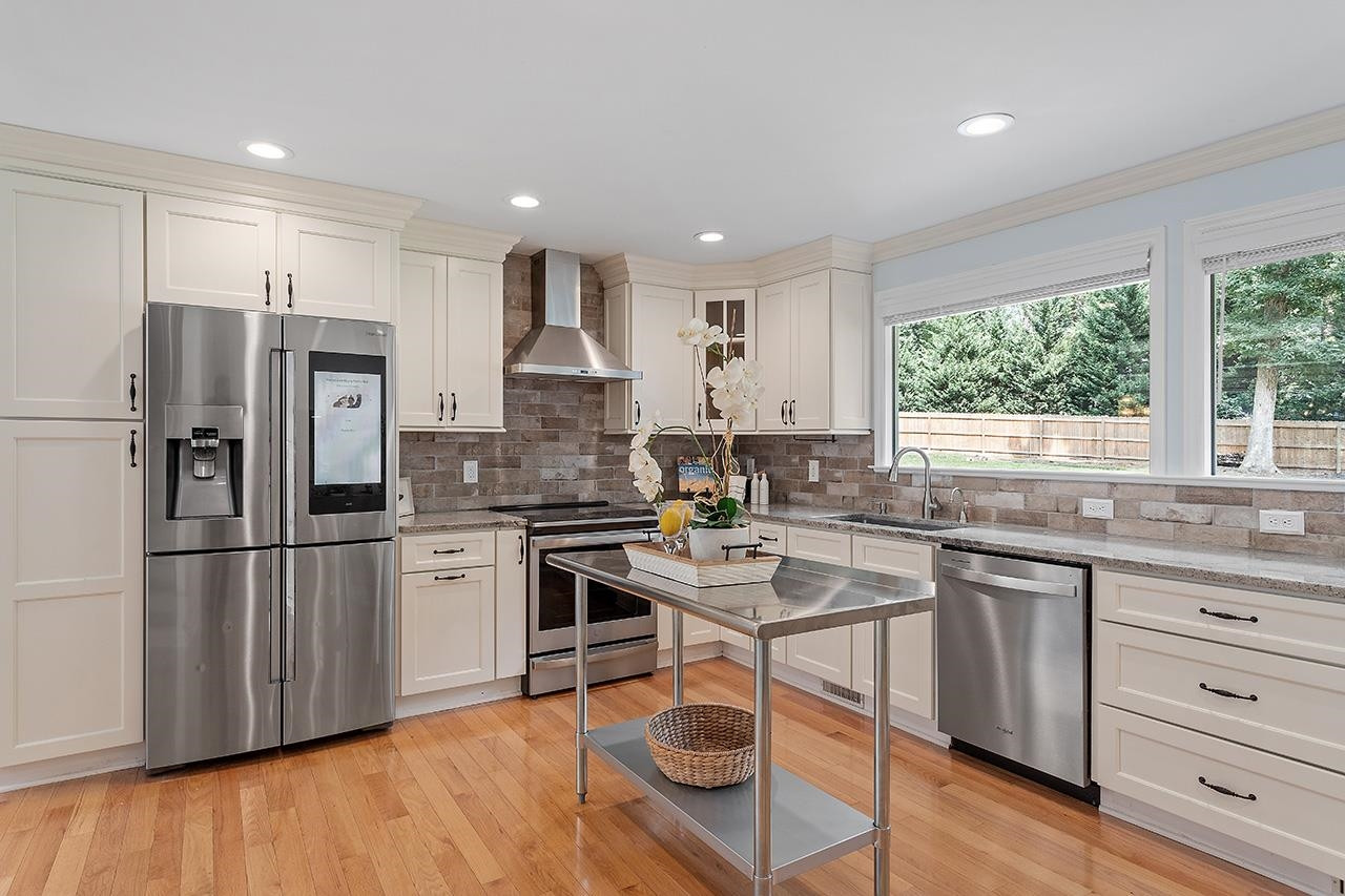 124 Bayleaf Drive Raleigh, NC 27615 - Photo 16 of 40 Kitchen w/Smart Fridge