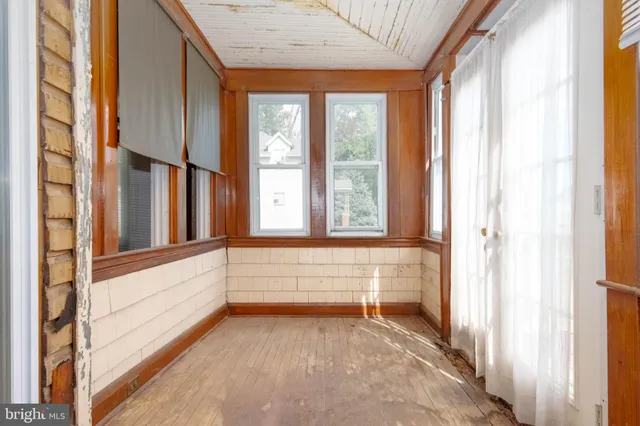 a view of an entryway with a window