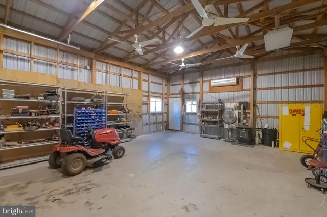 a view of a garage with parked cars