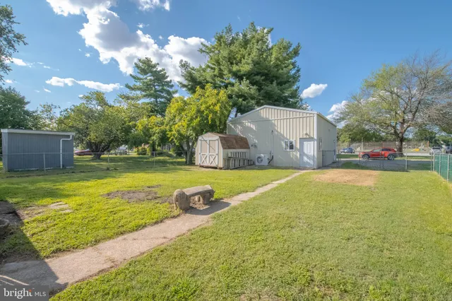 a view of a swimming pool with an outdoor space