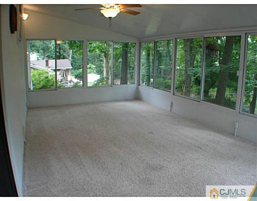 266 Hamlin Road North Brunswick, NJ 08902 - Photo 14 of 17 a view of a garden with an outdoor seating space