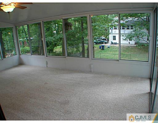 266 Hamlin Road North Brunswick, NJ 08902 - Photo 17 of 17 a view of a room with a big yard