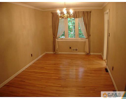266 Hamlin Road North Brunswick, NJ 08902 - Photo 4 of 17 a view of a bathroom with a window