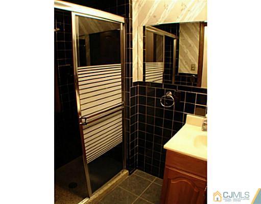 266 Hamlin Road North Brunswick, NJ 08902 - Photo 7 of 17 a view of a house with a door