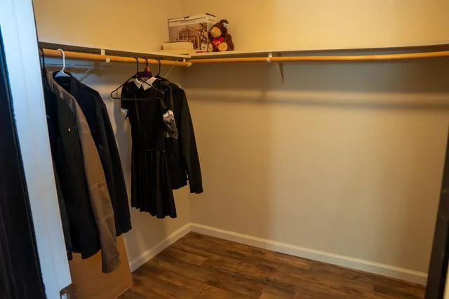 a view of a bedroom from a hallway