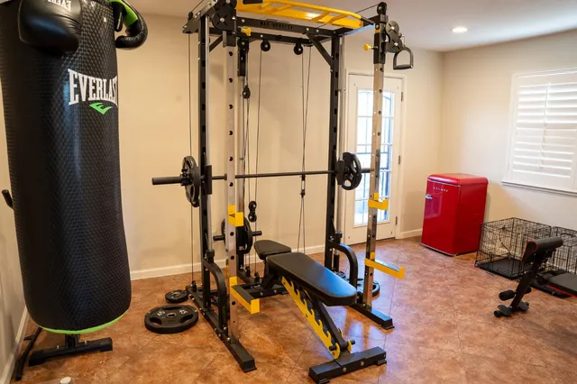 a view of a room with gym equipment
