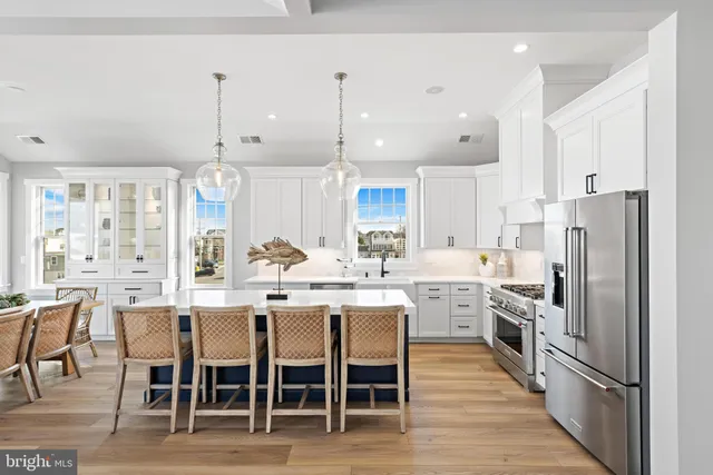 a spacious bedroom with a bed and a couch