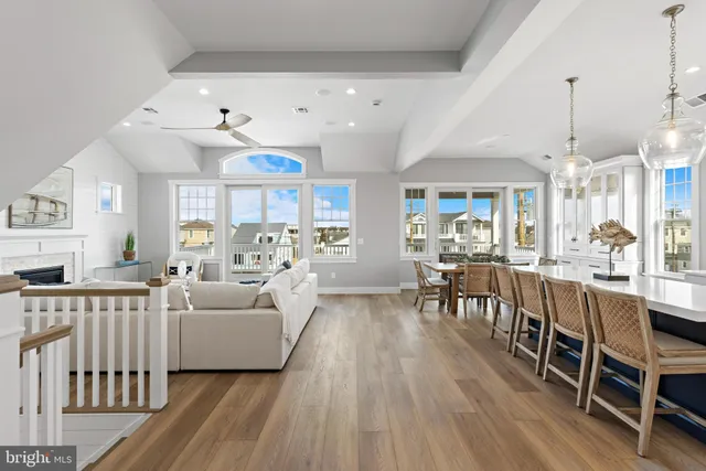 a spacious bedroom with a bed and a table