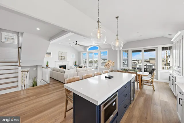 a bathroom with a toilet a sink and shower