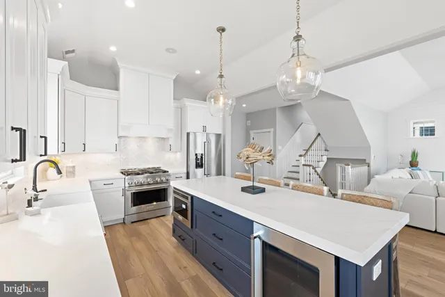 a bedroom with furniture and wooden floor