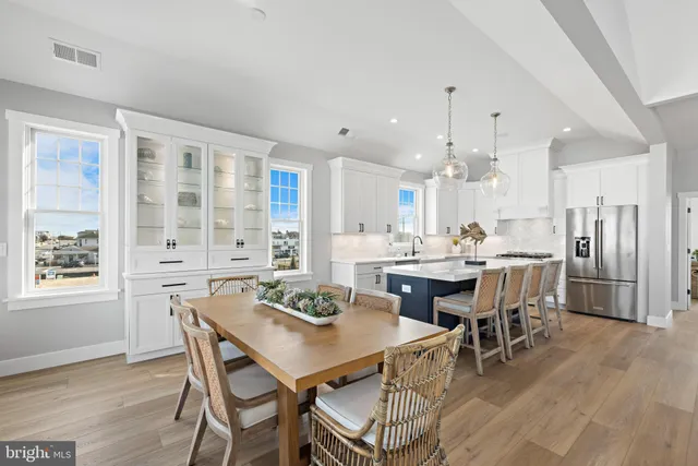 a bathroom with a sink a mirror and a shower