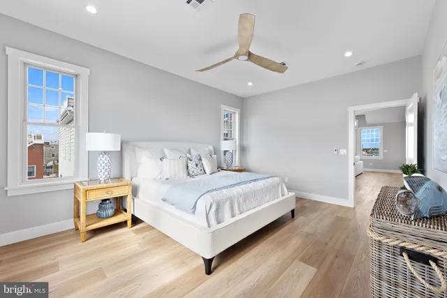 a view of a bathroom from a hallway