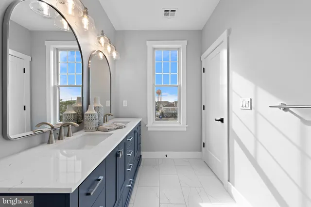 a view of an empty room with windows