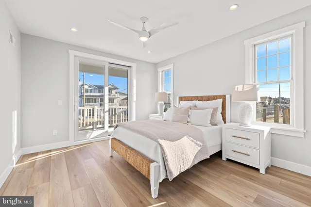 a outdoor space with a large window and furniture