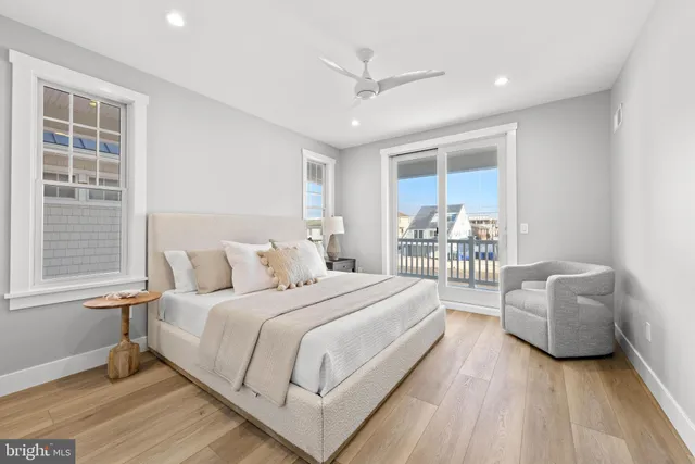 an aerial view of a building with glass windows