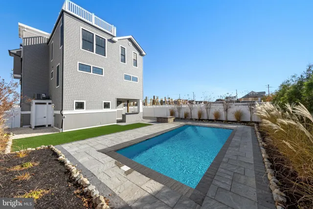 a living room with furniture a window and a fireplace