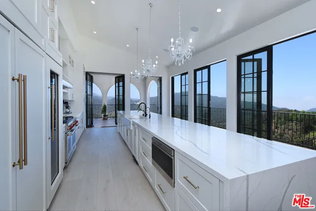 a view of swimming pool from a balcony