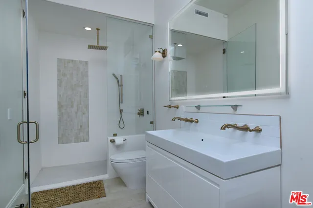 a view of balcony with a couple of trees