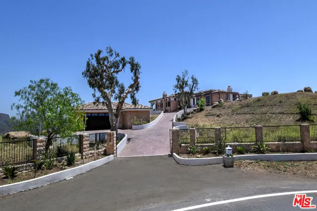 a view of a house with a patio