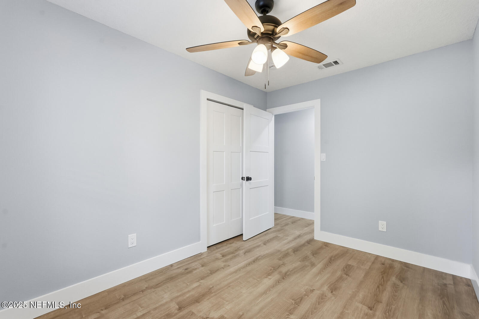 341 Alabama Avenue Palatka, FL 32177 - Photo 23 of 47 wooden floor in an empty room