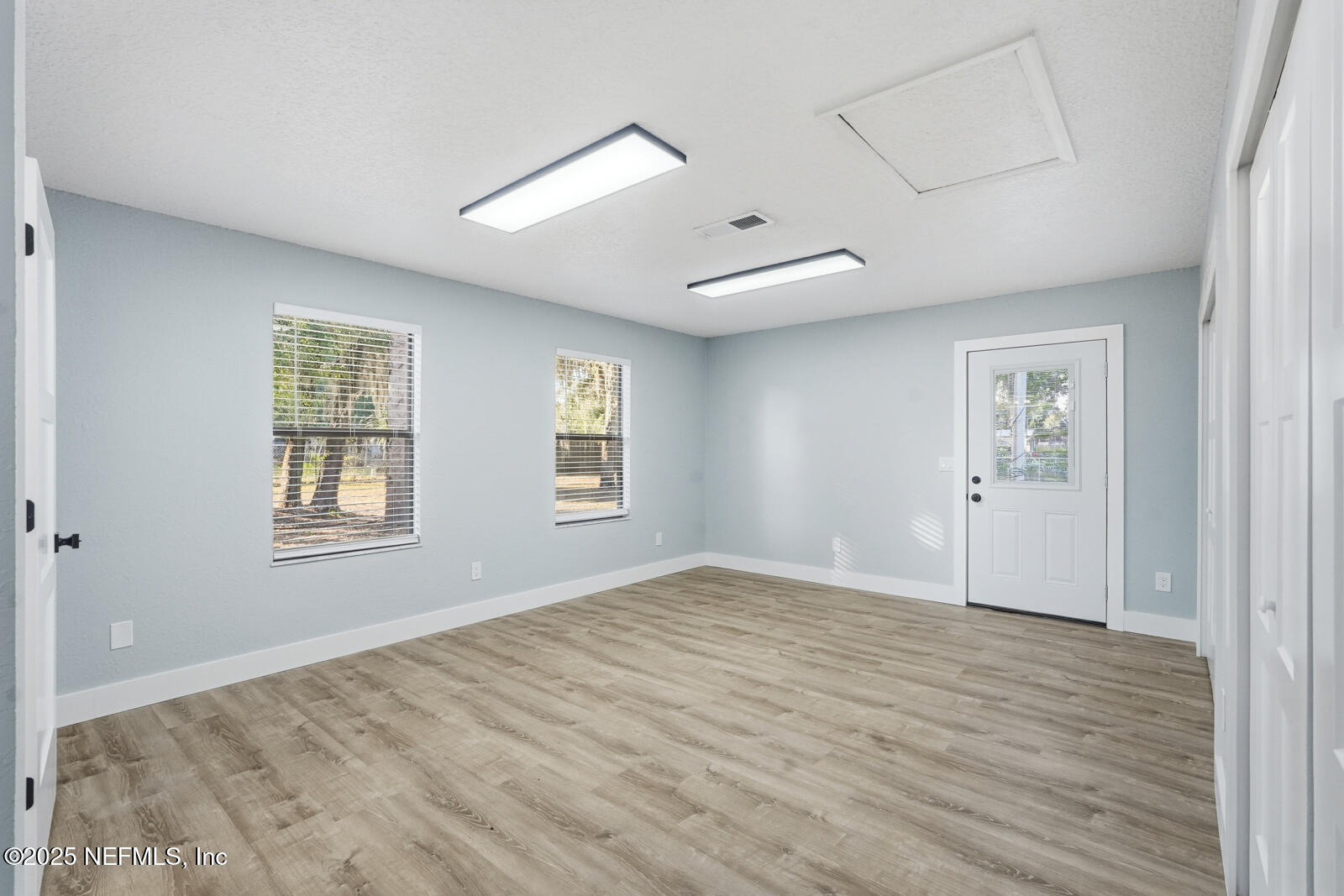 341 Alabama Avenue Palatka, FL 32177 - Photo 27 of 47 a view of an empty room with a window