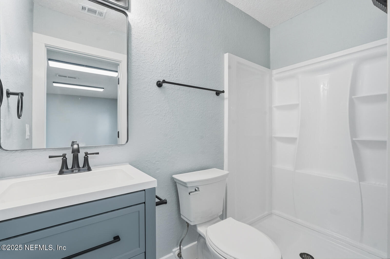 341 Alabama Avenue Palatka, FL 32177 - Photo 29 of 47 a bathroom with a sink a toilet and shower