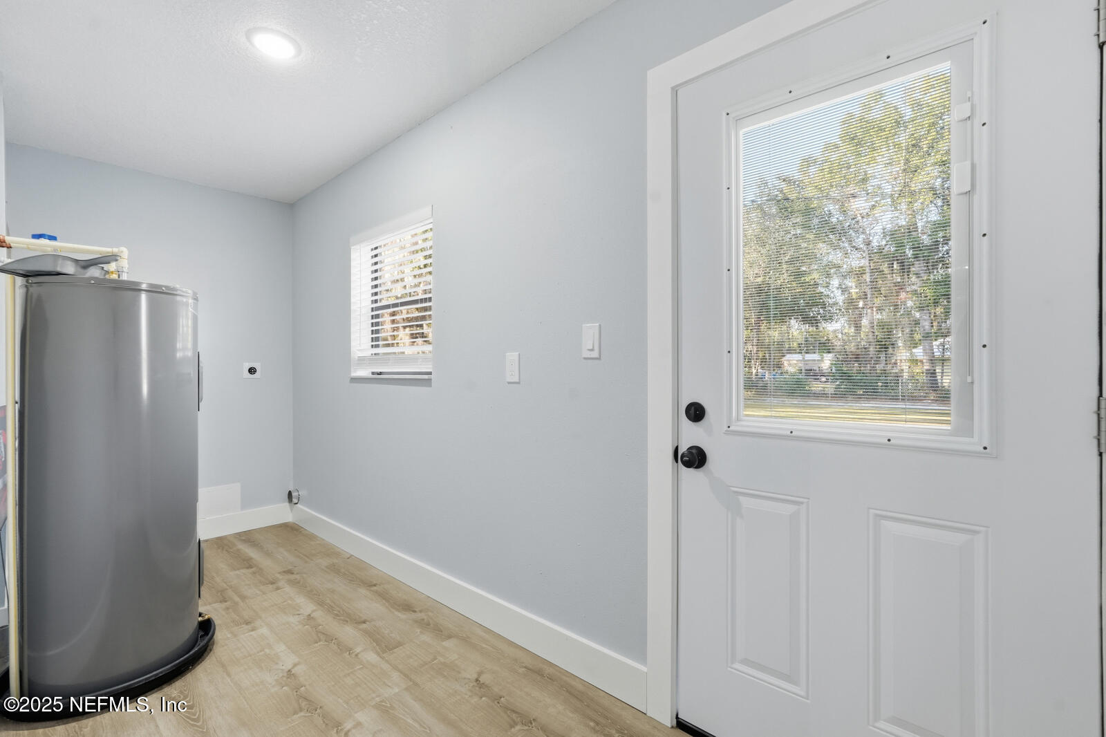 341 Alabama Avenue Palatka, FL 32177 - Photo 34 of 47 a view of an empty room with a window