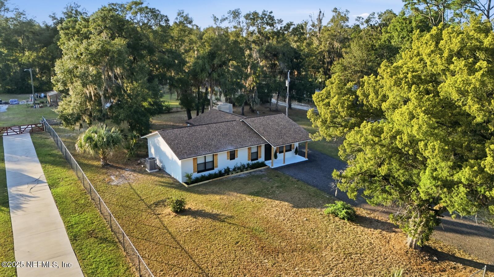 341 Alabama Avenue Palatka, FL 32177 - Photo 36 of 47 a view of a house with a yard
