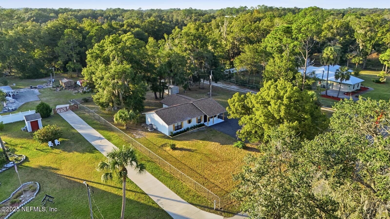 341 Alabama Avenue Palatka, FL 32177 - Photo 37 of 47 an aerial view of a house with a yard basket ball court and outdoor seating