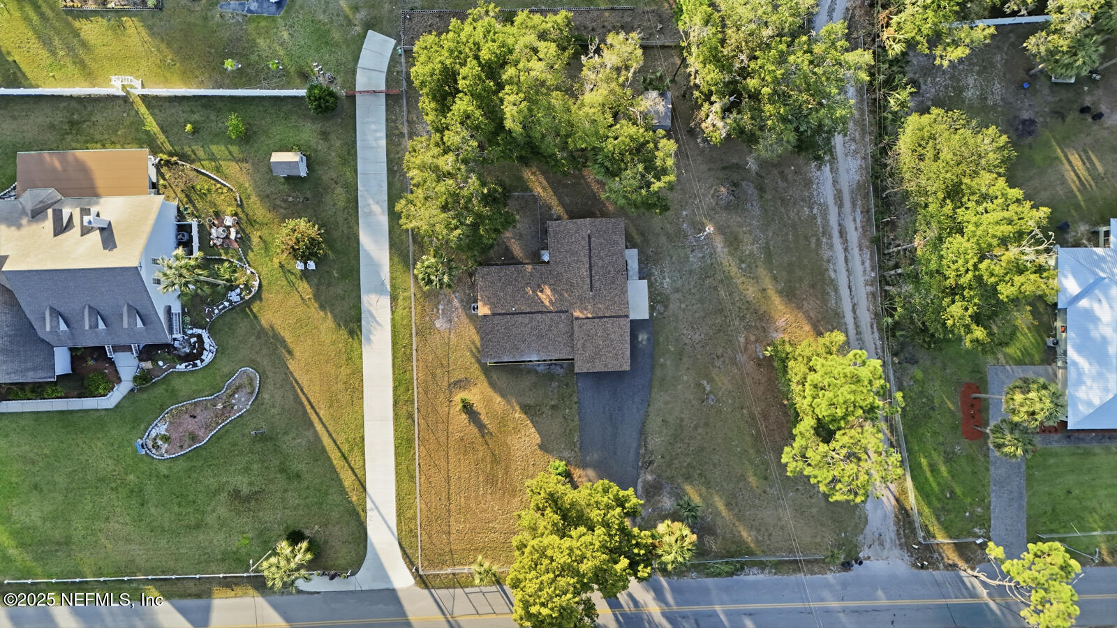 341 Alabama Avenue Palatka, FL 32177 - Photo 4 of 47 an aerial view of a house with a yard basket ball court