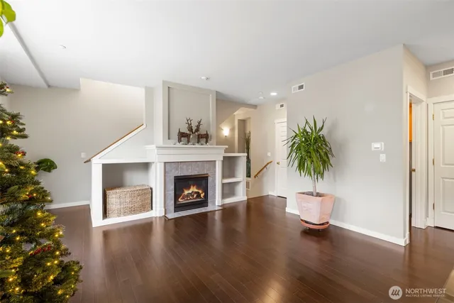 a kitchen with a refrigerator a sink and cabinets