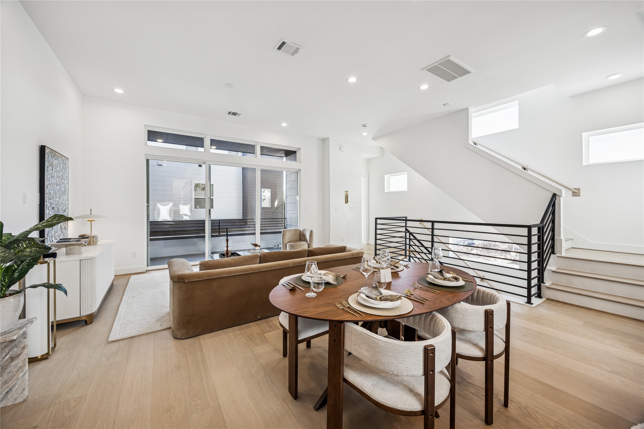 3008 Lamar Street Houston, TX 77003 - Photo 15 of 33 a view of a dining room with furniture window and wooden floor