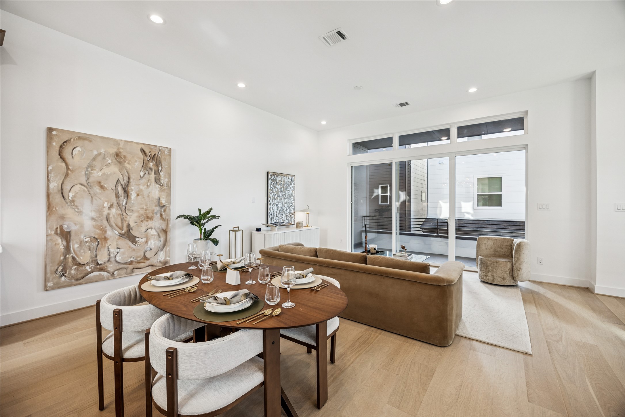3008 Lamar Street Houston, TX 77003 - Photo 17 of 33 a view of a dining room with furniture and wooden floor