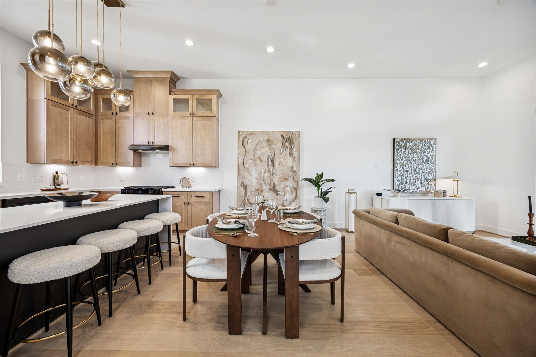 3008 Lamar Street Houston, TX 77003 - Photo 19 of 33 a view of a dining room with furniture and a chandelier