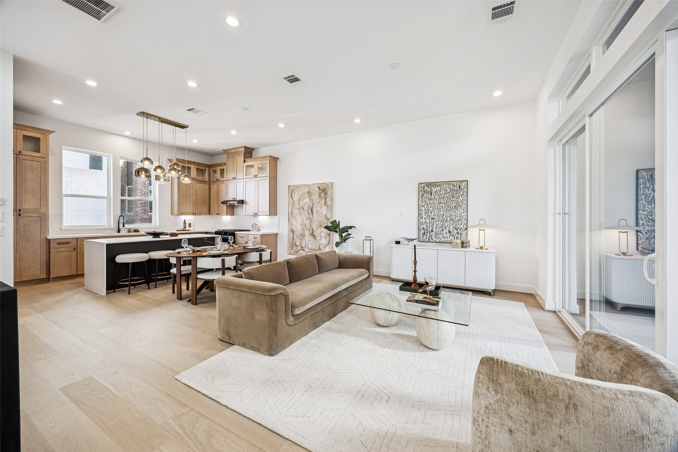 3008 Lamar Street Houston, TX 77003 - Photo 20 of 33 a living room with furniture and kitchen view