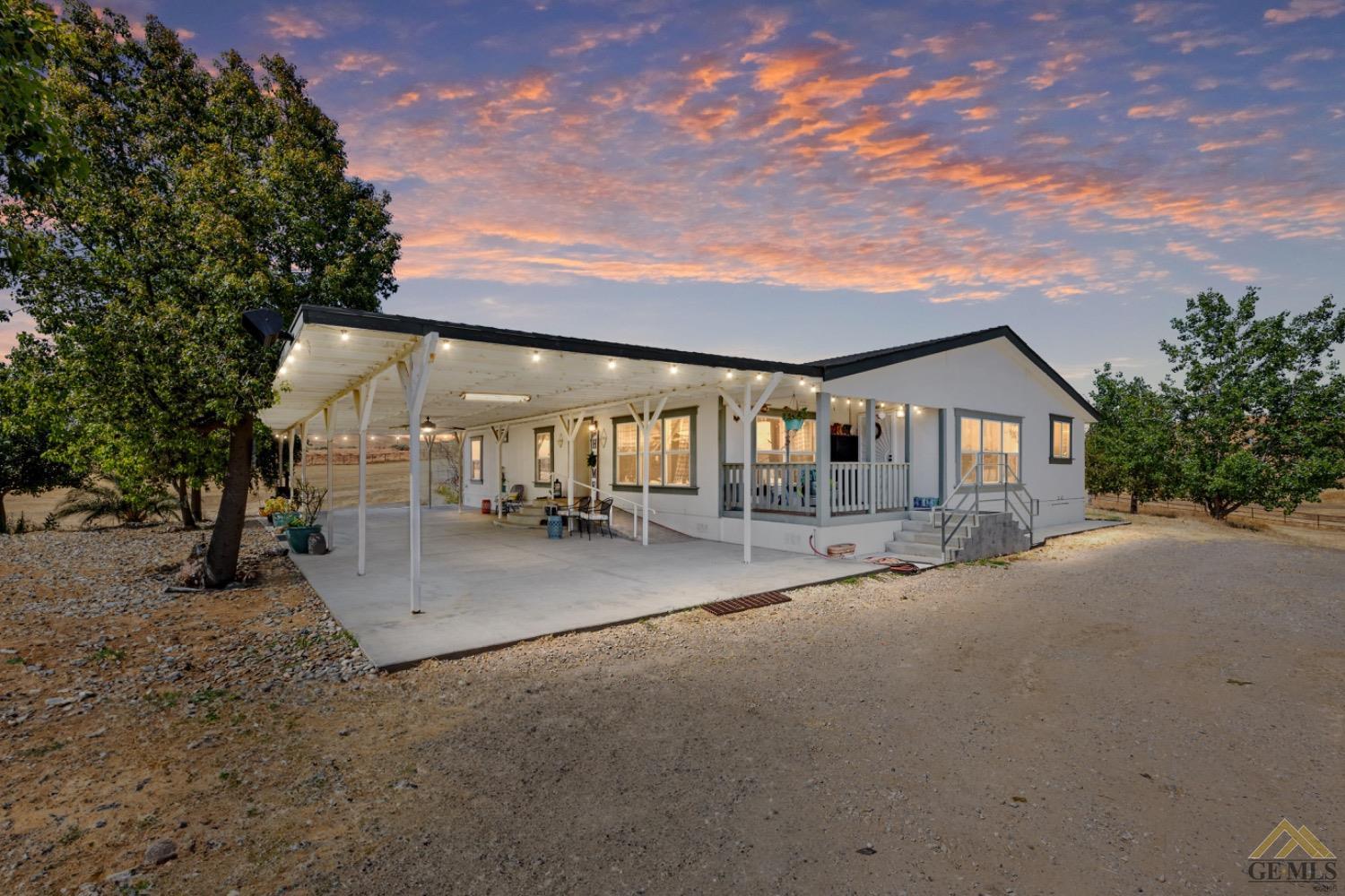 Undisclosed Address Bakersfield, CA 93308 - Photo 2 of 39 a view of a house with a street