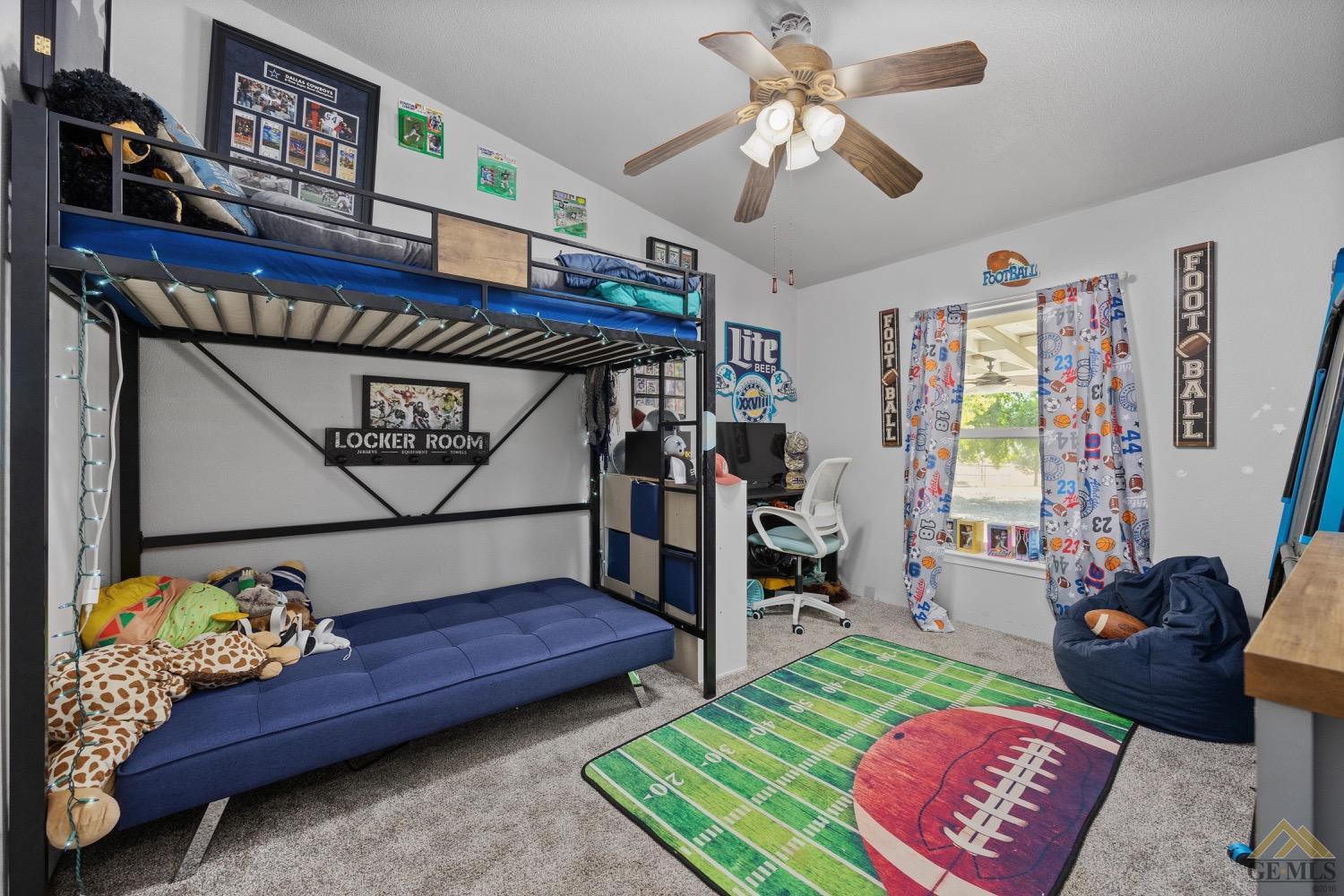 Undisclosed Address Bakersfield, CA 93308 - Photo 32 of 39 a bedroom with furniture and a wooden floor