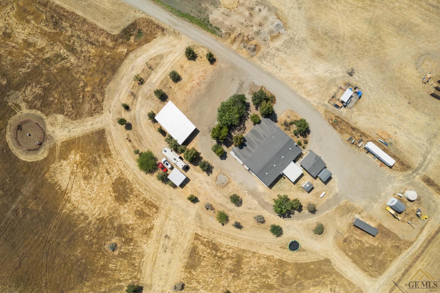 Undisclosed Address Bakersfield, CA 93308 - Photo 5 of 39 an aerial view of a house