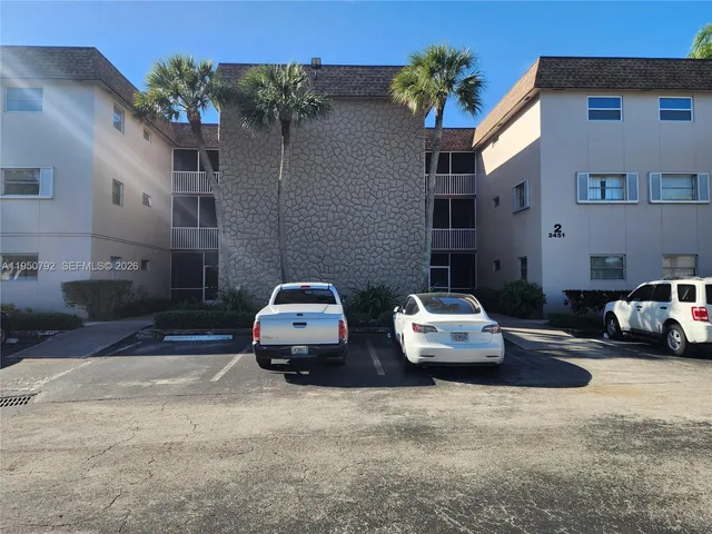 a car parked in front of a building
