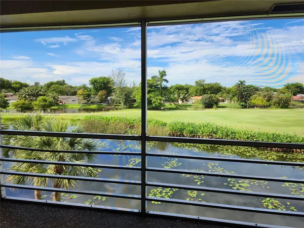 a view of outdoor space with a lake view