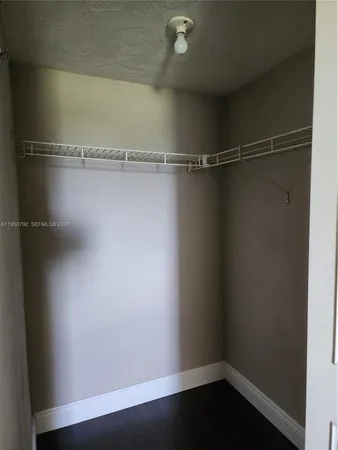 a view of a room with racks on the wall