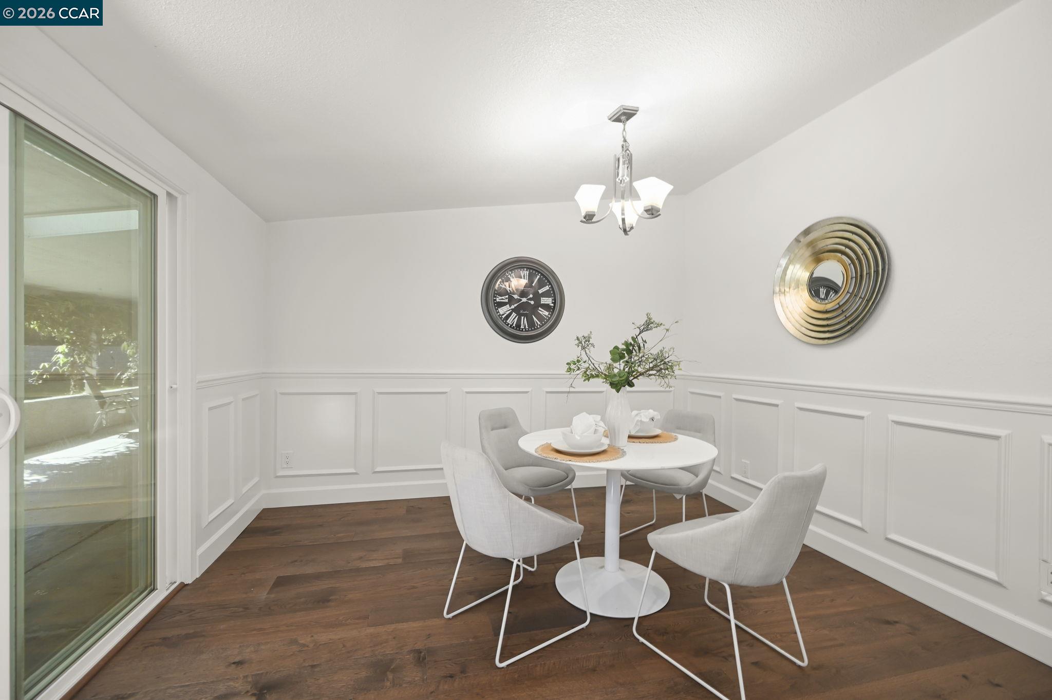3782 Hitchcock Road Concord, CA 94518 - Photo 12 of 30 Beautiful wainscoting in dining room - slider goes to covered patio