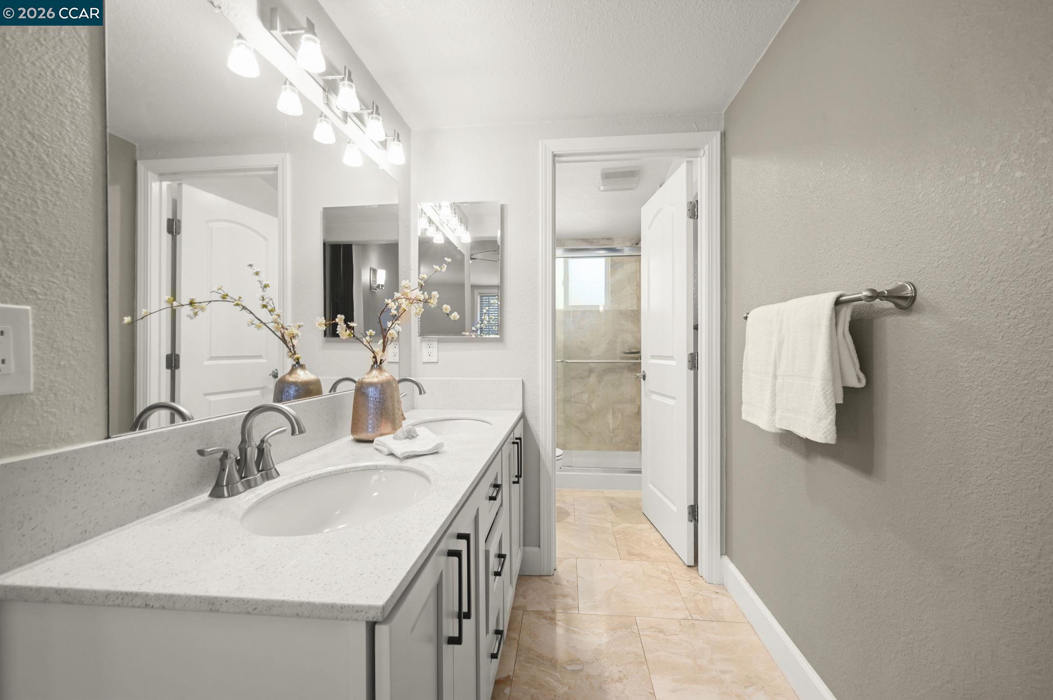 3782 Hitchcock Road Concord, CA 94518 - Photo 15 of 30 Beautifully refreshed primary bath, with dual sinks and separated bath.