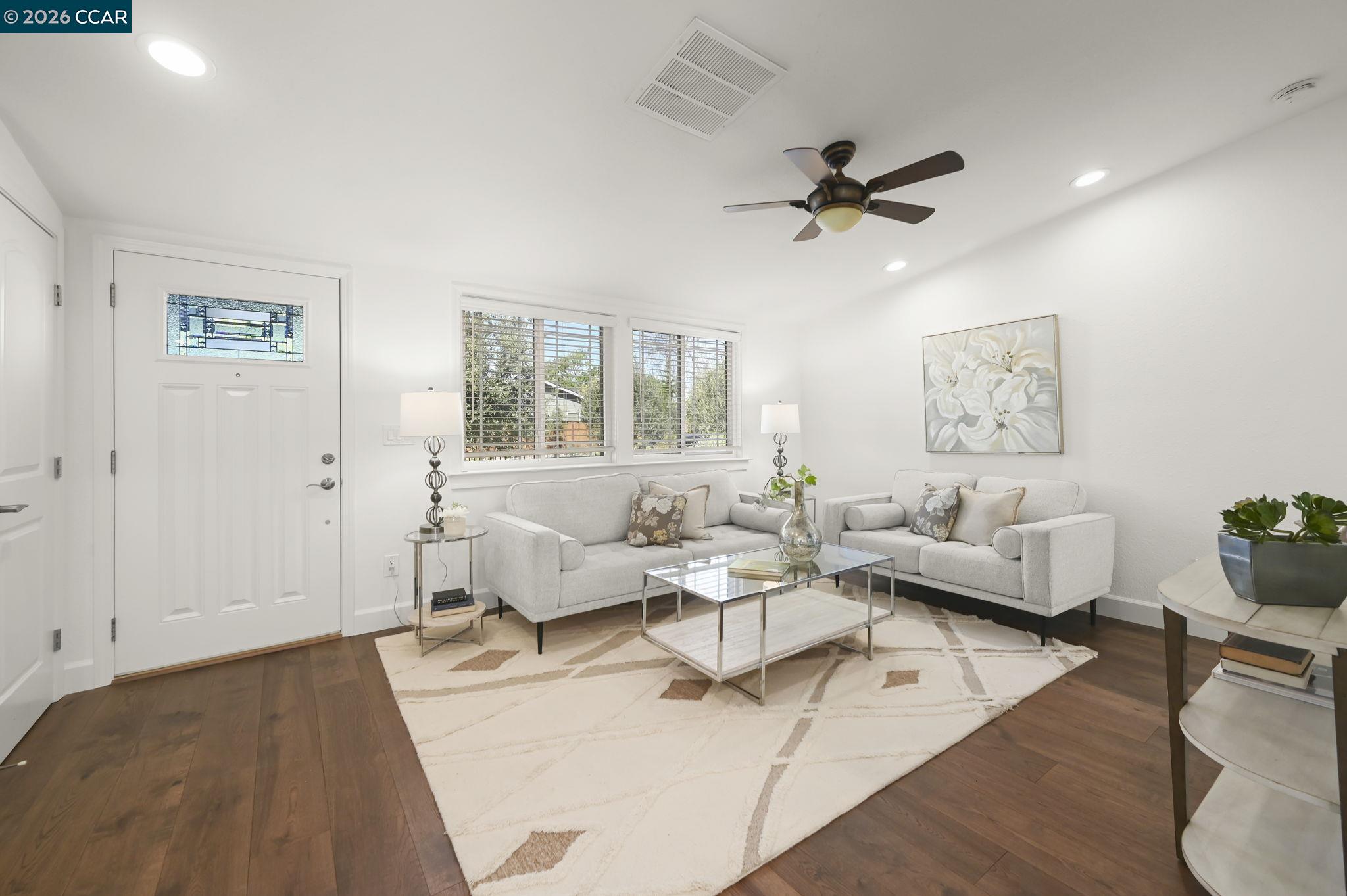 3782 Hitchcock Road Concord, CA 94518 - Photo 7 of 30 Spacious living room with new engineered hardwood flooring, freshly painted