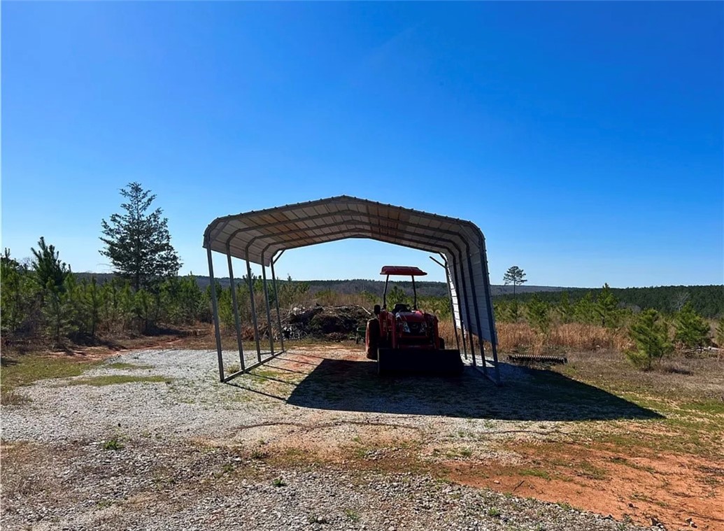 1 State Rd S-4-555 Iva, SC 29655 - Photo 13 of 27 This spacious rural lot offers ample open-air parking and captivating distant views.