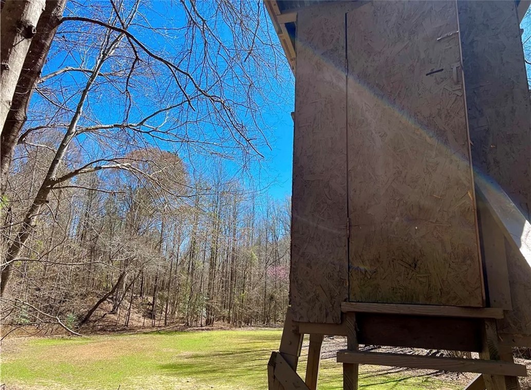 1 State Rd S-4-555 Iva, SC 29655 - Photo 21 of 27 This property features a structure providing storage or utility space amidst natural surroundings.