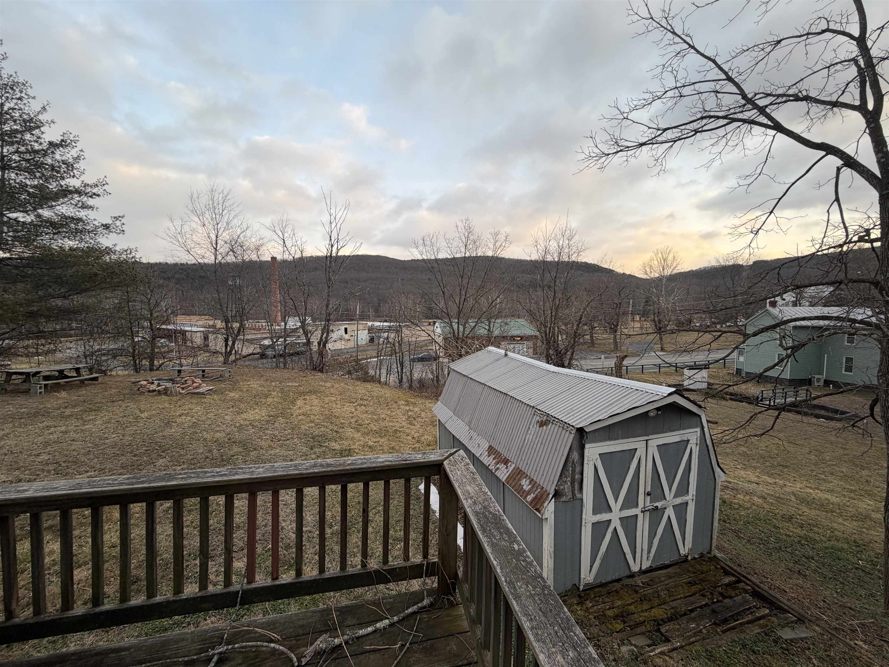 39 Church Hl Road Goshen, VA 24439 - Photo 24 of 27 a terrace of a house with yard table and seating